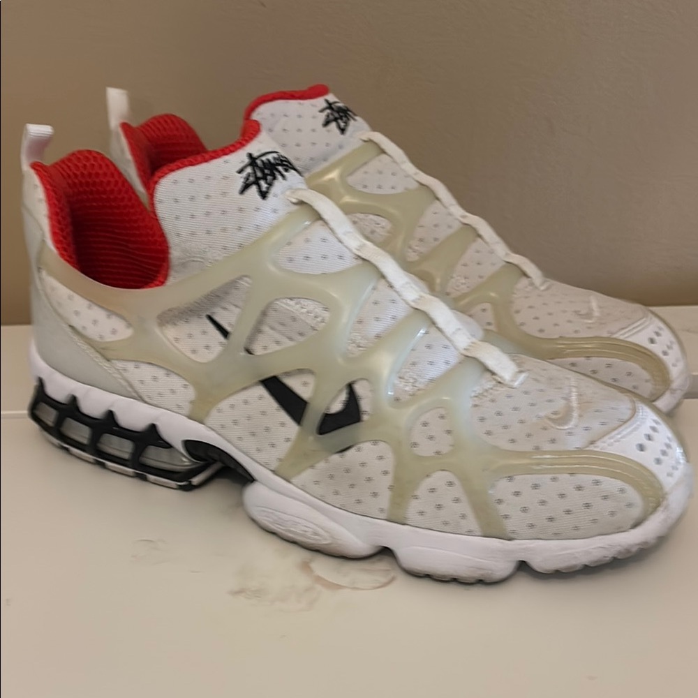Stussy White and Black Athletic Shoes with Red Highlights